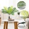 2 PCS Artificial Tropical Palm Leaves Plastic Shrubs Fern Leaves Fake Greenery Palm Plants with Stems Jungle Palm Tree Leaves for Home Garden Hawaiian Party Table Centerpieces Decor